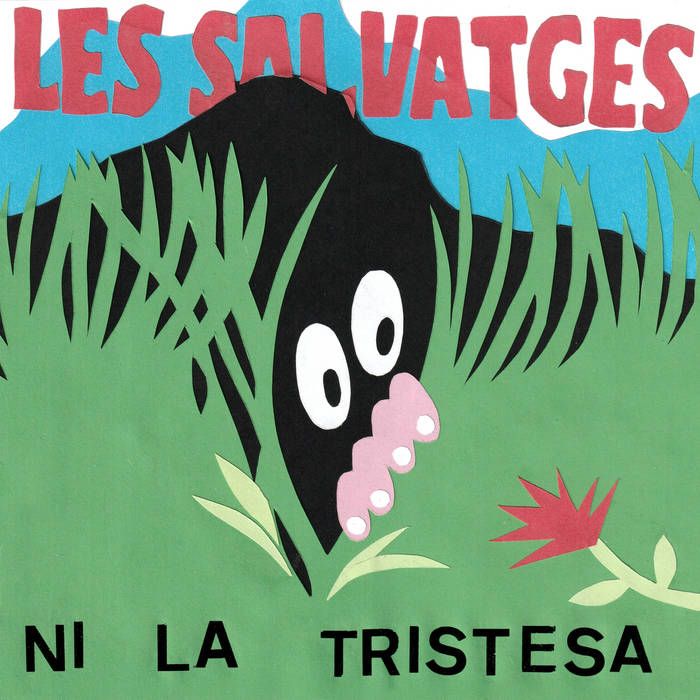 disseny del Joan Manel d'una ombra negre mirant a través d'un camp de gespa